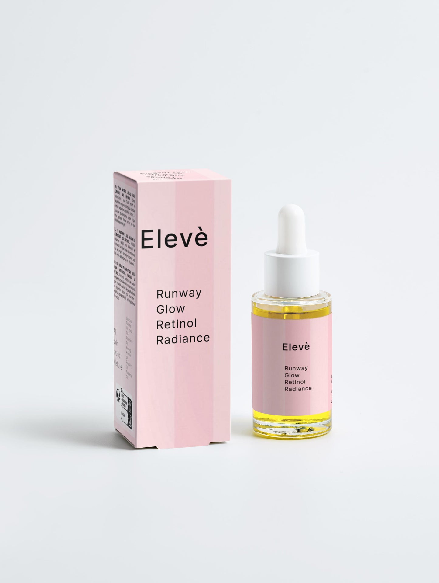 Elevè Runway Glow Retinol Alternative Oil Serum- Flakon und passende Verpackung nebeneinander vor weißem Hintergrund. Luxuriöses Anti-Aging-Ölserum mit Bakuchiol und nährenden Bio-Ölen für glattere, strahlende und revitalisierte Haut. 